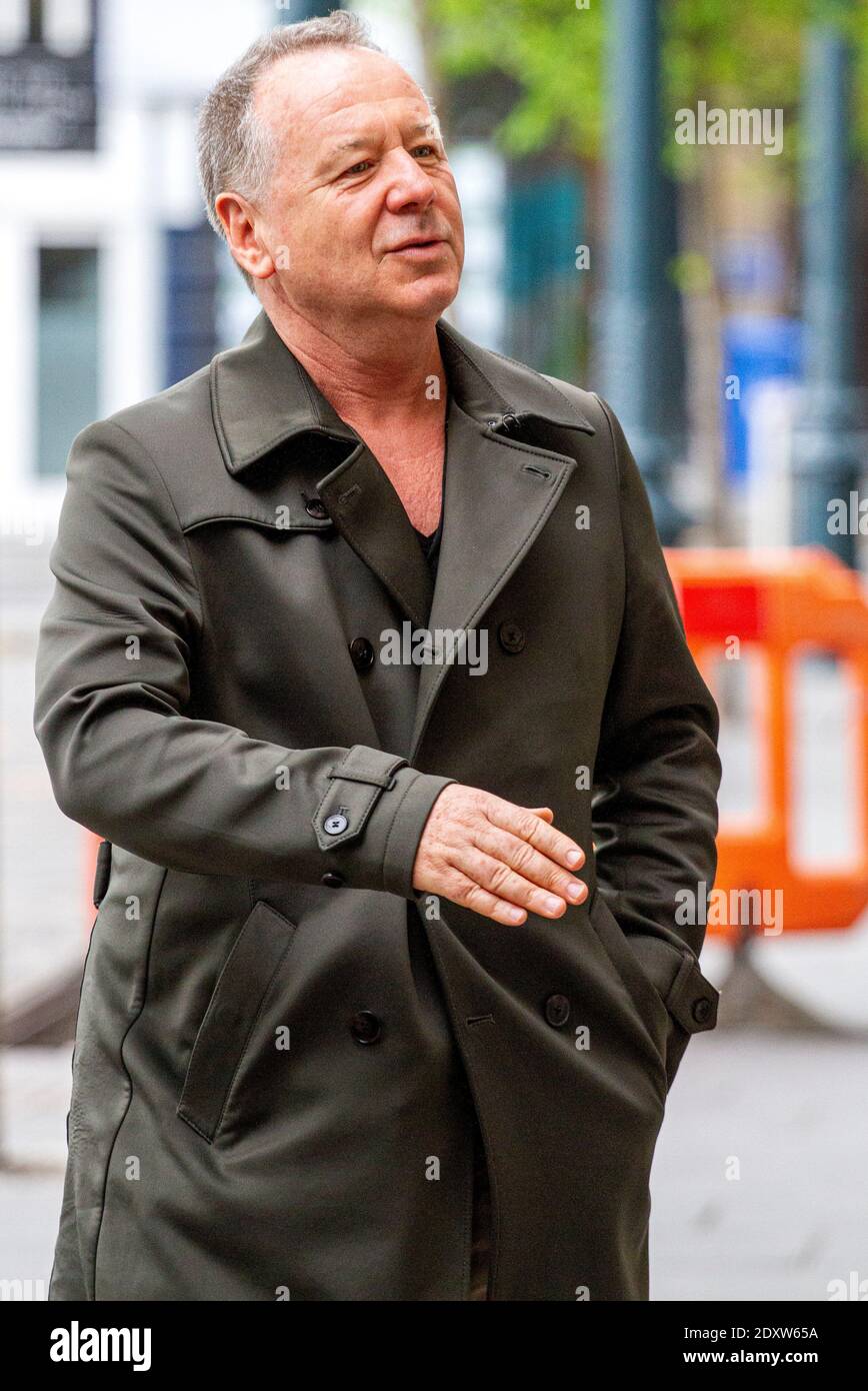 The 1980`s rock group Simple Minds arrived in Dundee, Scotland for the start of their UK tour of 17th May, 2017. Jim Kerr walking to meet the press officials outside the Caird Hall Back Stage entrance before their live concert Stock Photo
